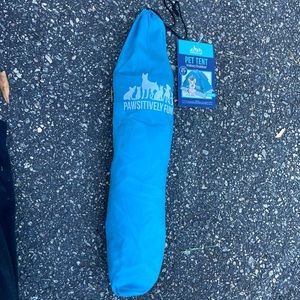 Here is a blue and gray pet tent. It’s very big and nice for an animal.